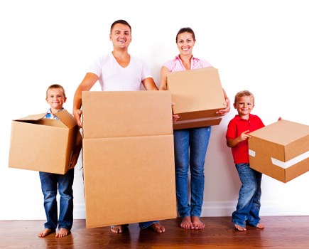Removal company team planning a move in Cranford residential street