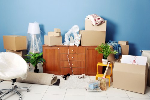 Packed furniture and boxes ready for transport by removal van