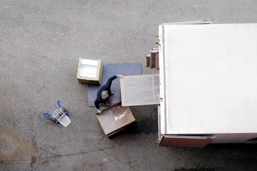 Local moving team handling boxes and furniture near Cranford streets