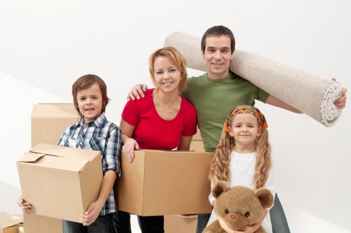Careful loading of household items into a moving van