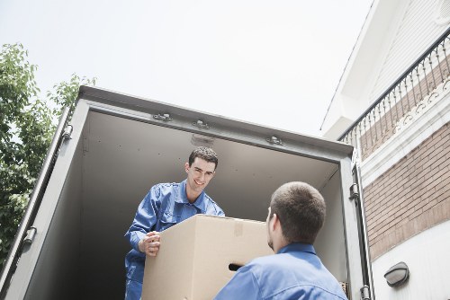 Local removal van loading household items in Cranford